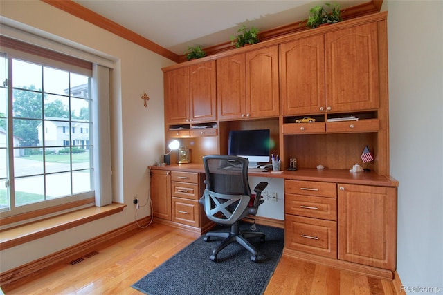38188 Mallory Dr, Livonia, MI 48154 - office with built in desk, healthy amount of natural light, and light wood-type flooring
