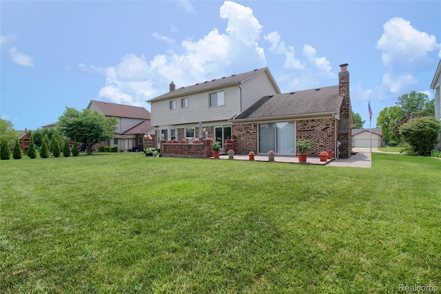 38188 Mallory Dr, Livonia, MI 48154 - rear view of house featuring a yard, a patio, brick siding, a chimney, and roof with shingles