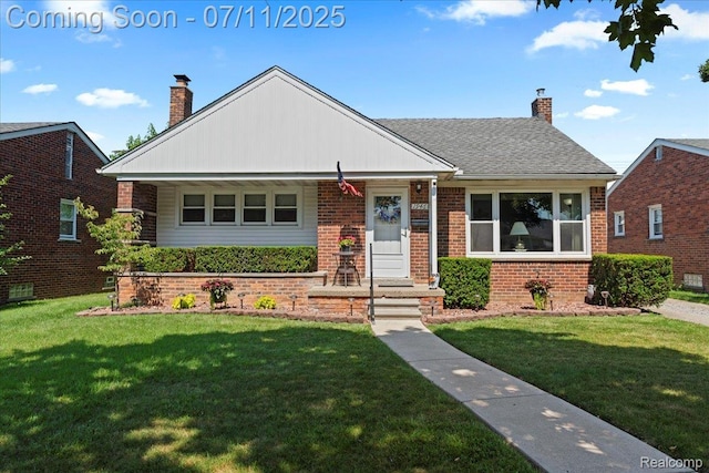 1946 Carlysle St, Dearborn, MI 48124 - bungalow-style house with a chimney, a front yard, brick siding, and a porch