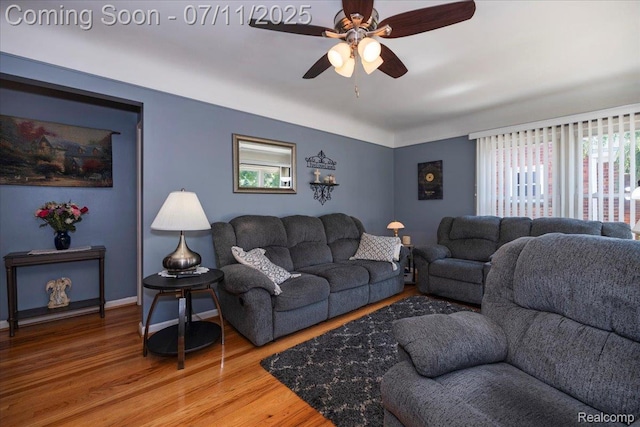 1946 Carlysle St, Dearborn, MI 48124 - living room featuring a ceiling fan and wood finished floors