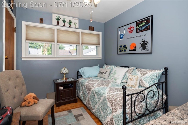 1946 Carlysle St, Dearborn, MI 48124 - bedroom with multiple windows and wood finished floors
