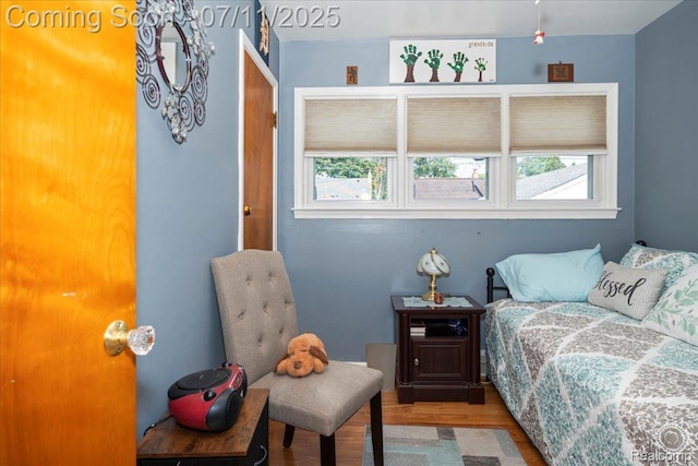 1946 Carlysle St, Dearborn, MI 48124 - bedroom featuring multiple windows and wood finished floors