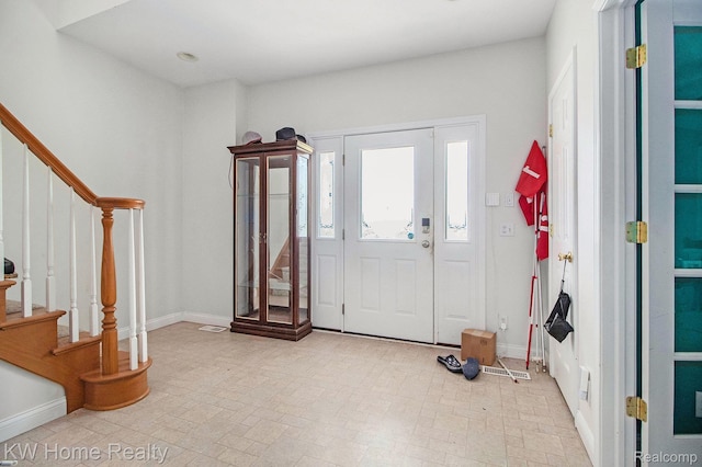 4450 Sylvan Rd, Grass Lake, MI 49240 - foyer entrance with stairs and baseboards