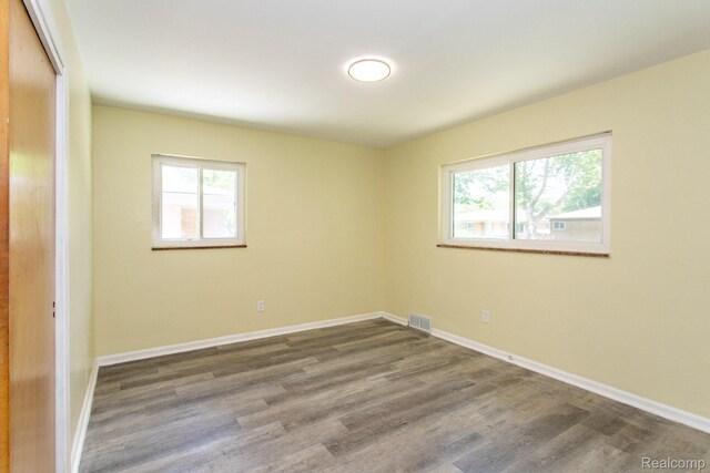 23461 Avon Rd, Oak Park, MI 48237 - spare room with wood finished floors and baseboards