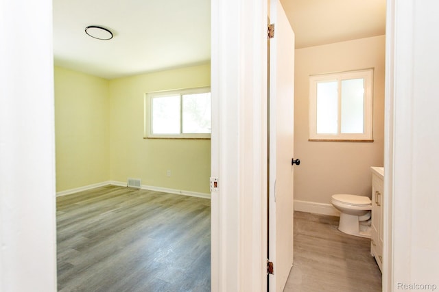 23461 Avon Rd, Oak Park, MI 48237 - bathroom featuring wood finished floors and vanity