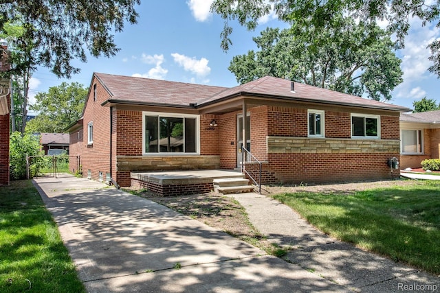 23461 Avon Rd, Oak Park, MI 48237 - view of front of property featuring brick siding and concrete driveway