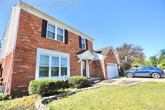 45587 Hanford Rd, Canton, MI 48187 - traditional home with brick siding, driveway, a front lawn, and a garage