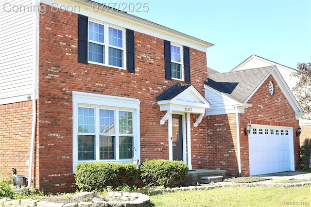 45587 Hanford Rd, Canton, MI 48187 - view of front of property with an attached garage and brick siding