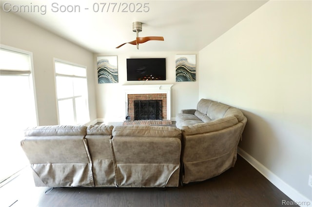 45587 Hanford Rd, Canton, MI 48187 - living area featuring ceiling fan, a fireplace, and dark wood-style flooring