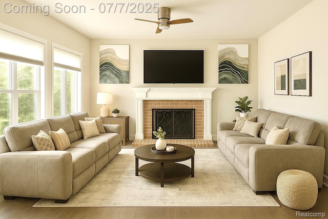 45587 Hanford Rd, Canton, MI 48187 - living room with a ceiling fan, light wood-style flooring, and a brick fireplace