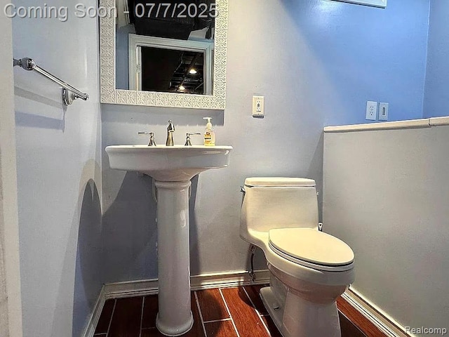 45587 Hanford Rd, Canton, MI 48187 - half bathroom featuring toilet and wood finished floors