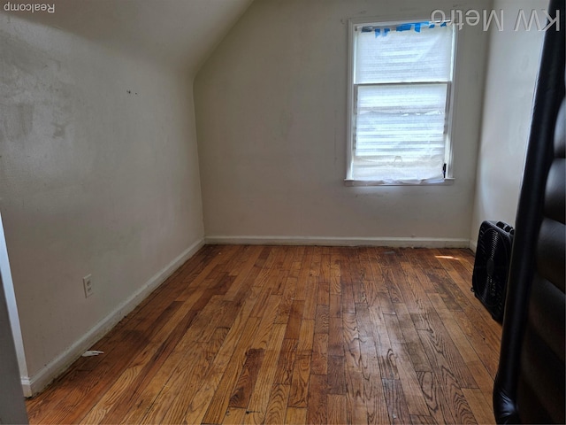 18639 Kelly Rd, Detroit, MI 48224 - additional living space with hardwood / wood-style flooring, vaulted ceiling, and heating unit