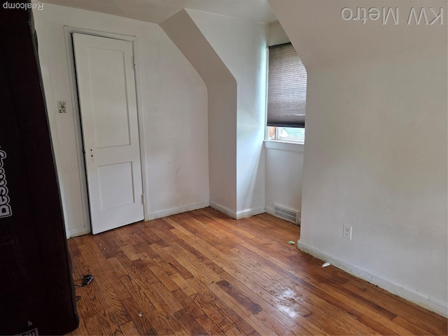 18639 Kelly Rd, Detroit, MI 48224 - additional living space featuring hardwood / wood-style flooring and baseboards