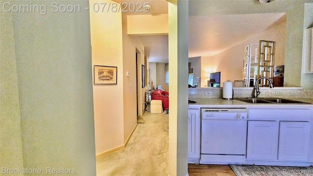 20059 Rodeo Ct, Southfield, MI 48075 - kitchen featuring white dishwasher and light countertops