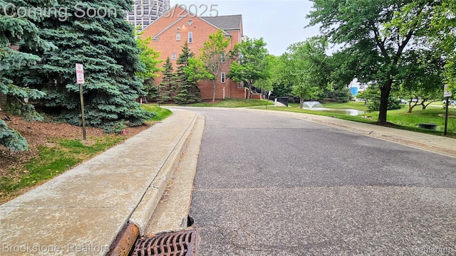 20059 Rodeo Ct, Southfield, MI 48075 - view of asphalt street featuring sidewalks and curbs