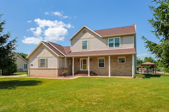 8181 Fawn Meadow Trl, Galesburg, MI 49053 - view of front of property featuring a gazebo, a chimney, a front lawn, and brick siding