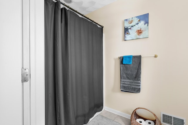 8181 Fawn Meadow Trl, Galesburg, MI 49053 - full bathroom featuring tile patterned flooring and a shower with shower curtain
