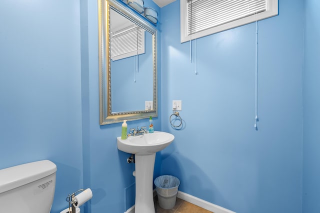 8181 Fawn Meadow Trl, Galesburg, MI 49053 - bathroom featuring toilet and tile patterned floors