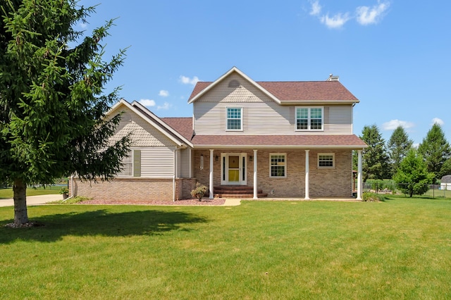 8181 Fawn Meadow Trl, Galesburg, MI 49053 - view of front facade featuring brick siding, roof with shingles, and a porch