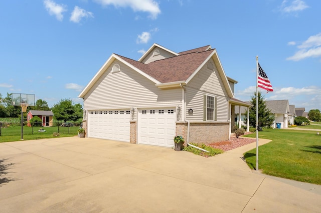 8181 Fawn Meadow Trl, Galesburg, MI 49053 - view of side of property featuring a shingled roof, driveway, a yard, brick siding, and an attached garage