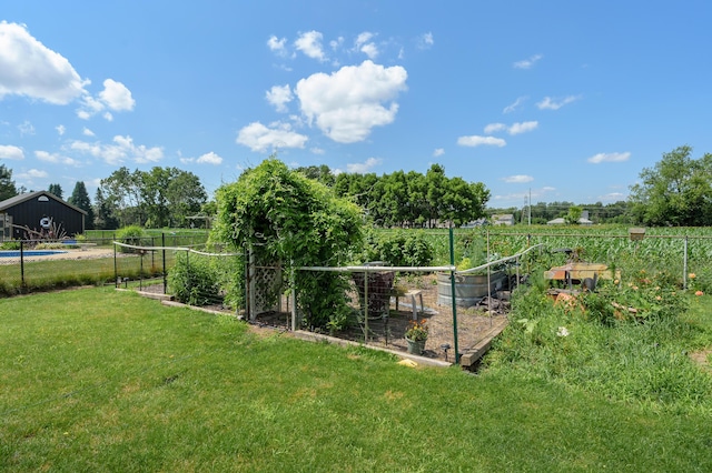 8181 Fawn Meadow Trl, Galesburg, MI 49053 - view of yard featuring a vegetable garden