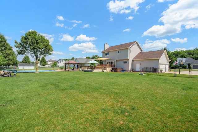8181 Fawn Meadow Trl, Galesburg, MI 49053 - view of yard featuring a gazebo, a garage, and a wooden deck
