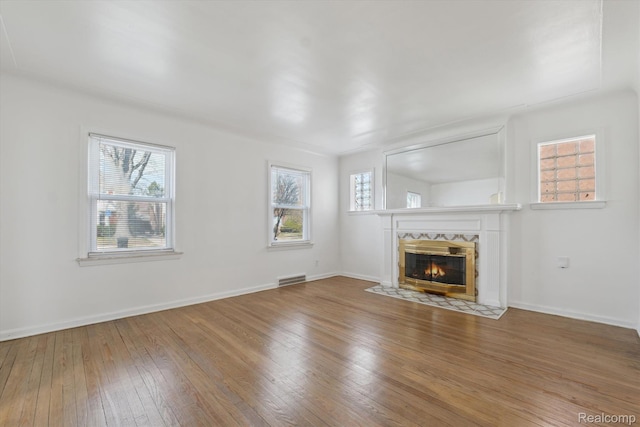 19340 Appoline St, Detroit, MI 48235 - unfurnished living room with hardwood / wood-style flooring and a high end fireplace