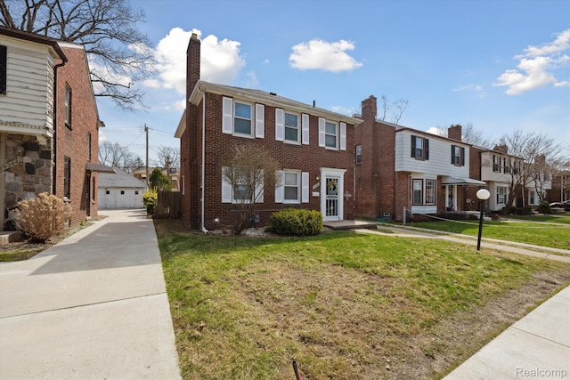 19340 Appoline St, Detroit, MI 48235 - view of property with a residential view, a front lawn, and a chimney