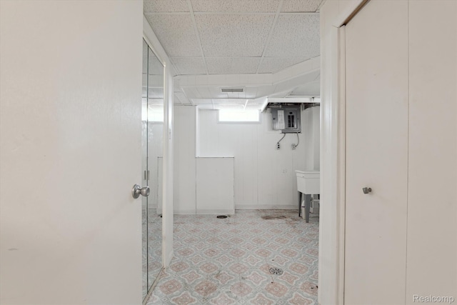 19340 Appoline St, Detroit, MI 48235 - bathroom featuring a paneled ceiling, electric panel, and tile patterned floors