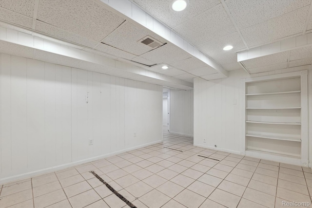 19340 Appoline St, Detroit, MI 48235 - empty room with a drop ceiling, recessed lighting, and tile patterned floors