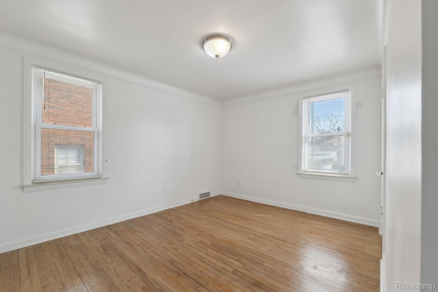 19340 Appoline St, Detroit, MI 48235 - spare room featuring hardwood / wood-style floors