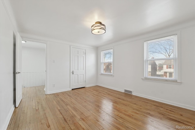 19340 Appoline St, Detroit, MI 48235 - unfurnished bedroom with light wood-style floors and a closet