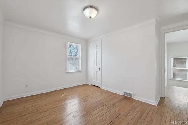 19340 Appoline St, Detroit, MI 48235 - unfurnished room with light wood-type flooring and ornamental molding
