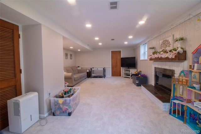 21102 Knudsen Dr, Grosse Ile, MI 48138 - living room with carpet, a glass covered fireplace, and recessed lighting