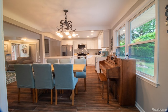 21102 Knudsen Dr, Grosse Ile, MI 48138 - dining area with dark wood-style floors, plenty of natural light, a chandelier, and recessed lighting
