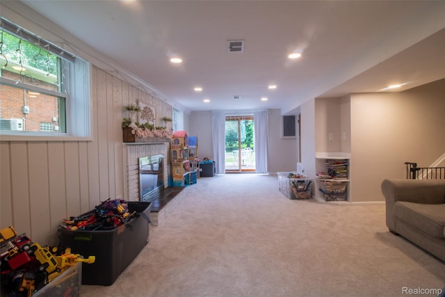 21102 Knudsen Dr, Grosse Ile, MI 48138 - carpeted living area featuring recessed lighting and a glass covered fireplace