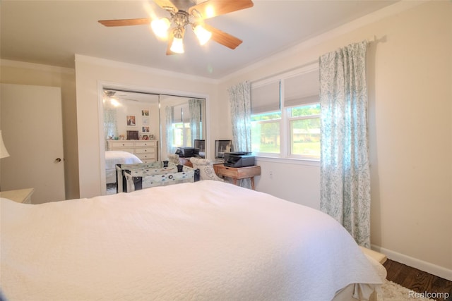 21102 Knudsen Dr, Grosse Ile, MI 48138 - bedroom with wood finished floors, a closet, and ceiling fan