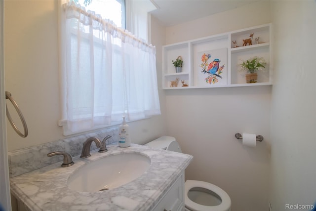 21102 Knudsen Dr, Grosse Ile, MI 48138 - half bathroom with toilet and vanity