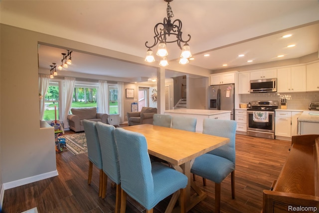 21102 Knudsen Dr, Grosse Ile, MI 48138 - dining space with stairway, dark wood-style flooring, recessed lighting, and a chandelier