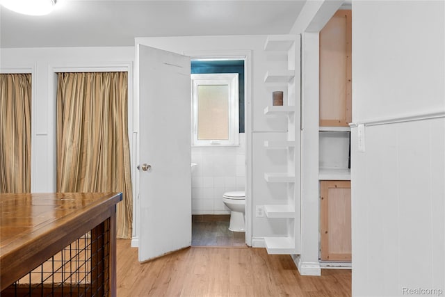 6917 Belton St, Garden City, MI 48135 - bathroom featuring wood finished floors and tile walls