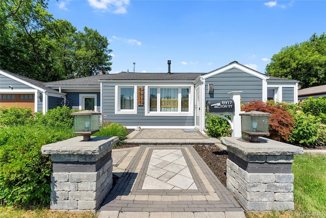 6917 Belton St, Garden City, MI 48135 - back of property with a shingled roof