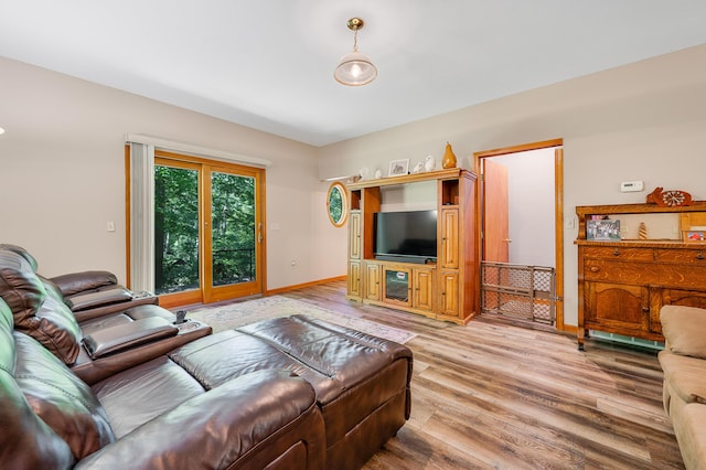 8361 9 Mile Rd, Big Rapids, MI 49307 - living room with light wood-style floors and baseboards