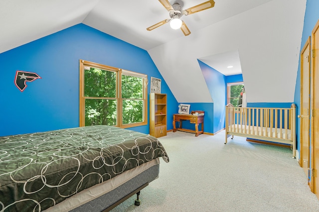 8361 9 Mile Rd, Big Rapids, MI 49307 - carpeted bedroom with lofted ceiling and ceiling fan