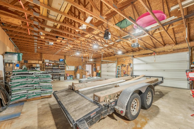 8361 9 Mile Rd, Big Rapids, MI 49307 - garage featuring a garage door opener