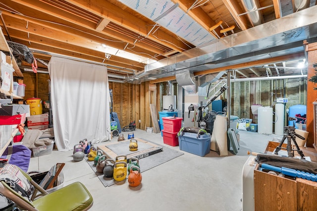 8361 9 Mile Rd, Big Rapids, MI 49307 - unfinished below grade area featuring a water softener system