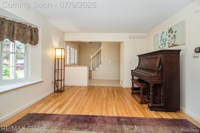 6706 Brookshire Dr, Canton, MI 48187 - living room featuring wood finished floors and stairway