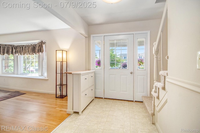 6706 Brookshire Dr, Canton, MI 48187 - foyer with stairway and light wood-style floors