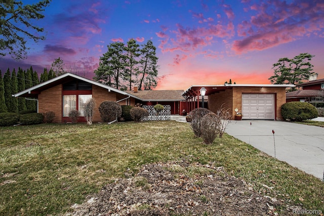5178 Helga St, Saginaw, MI 48603 - mid-century inspired home with an attached garage, driveway, a lawn, and a chimney