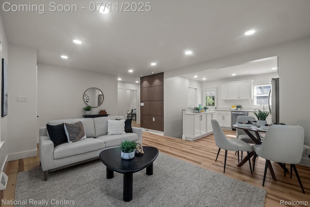 1089 Tecumseh Ave, Waterford, MI 48327 - living area with light wood-type flooring and recessed lighting