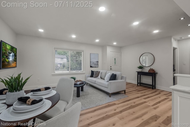 1089 Tecumseh Ave, Waterford, MI 48327 - living area with light wood-style flooring and recessed lighting